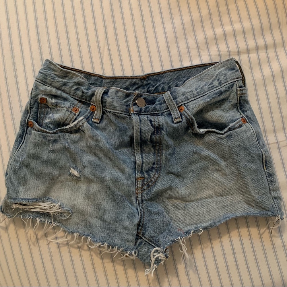Levi’s light-washed ripped denim shorts